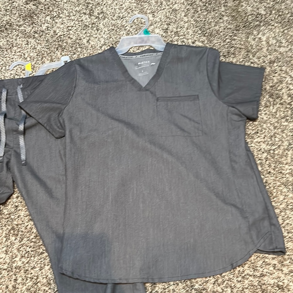 Size large only worn a couple of times job changed colors